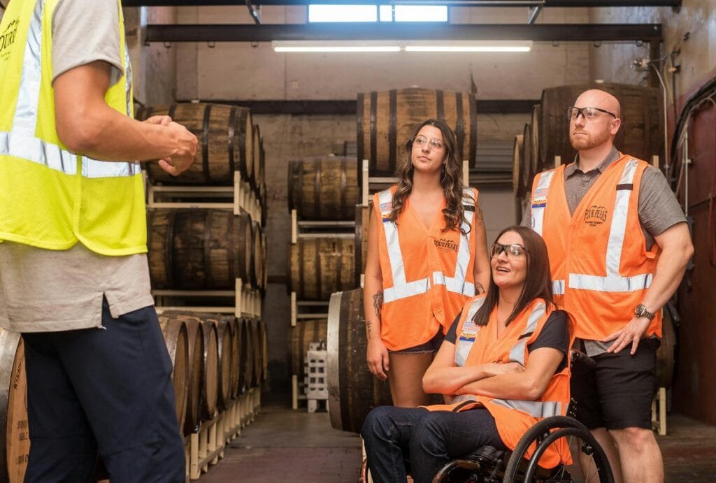 man giving a tour of a brewery